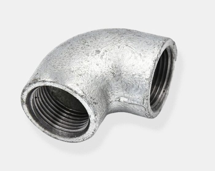 A GI elbow, a plumbing fitting used to change the direction of a pipeline.