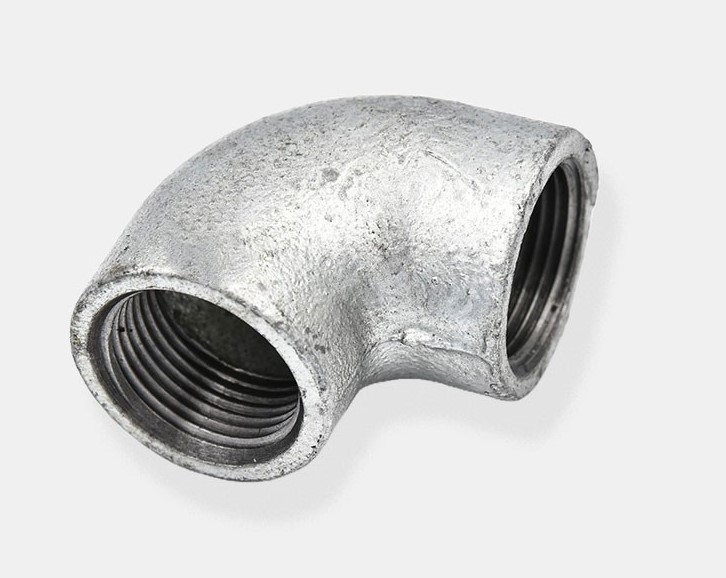 A GI elbow, a plumbing fitting used to change the direction of a pipeline.