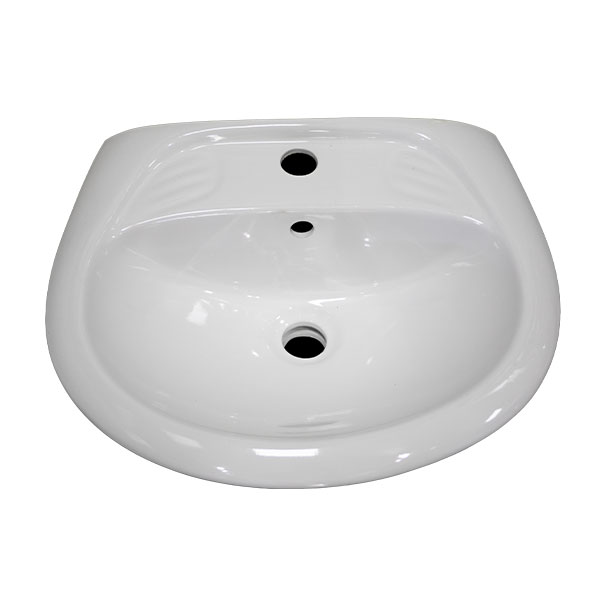 A top-down view of a white, ceramic wash hand basin with three holes for a tap, a drain, and an overflow.