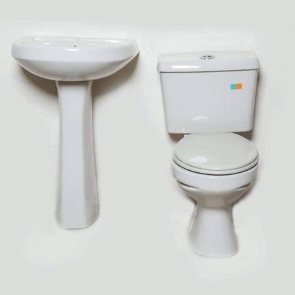 A white close-coupled toilet and a matching white pedestal washbasin, displayed side-by-side as a complete bathroom set.
