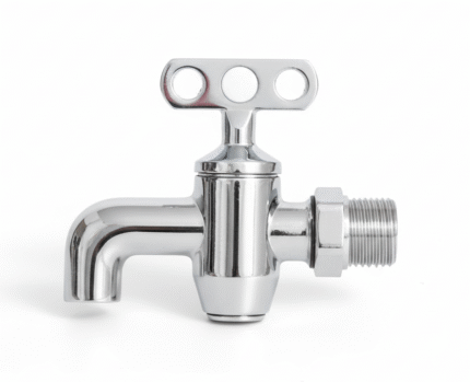 A chrome-finished cartoon tap with a short spout and a unique key-shaped handle with three circular cutouts. The tap has a threaded pipe connection on its right side.