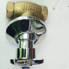A photo of a two-part plumbing valve. The top section is a brass-colored stop cork with "LIRLEE" stamped on it. The bottom section is a shiny chrome handle with a star-shaped knob, designed for a concealed installation.