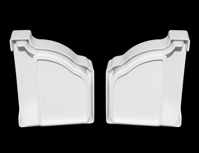 A pair of light gray PTG end caps on a black background. The end caps are identical, with a smooth, semi-circular shape designed to fit a gutter.