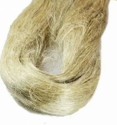 A pile of natural hemp fibers or tow, which is a traditional material used for sealing pipe threads. The fibers are light brown or straw-colored and have a rough, coarse texture.