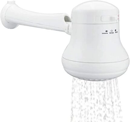 A close-up of a white, wall-mounted instant shower head with water spraying from its nozzles. It has an adjustable setting dial on the side.