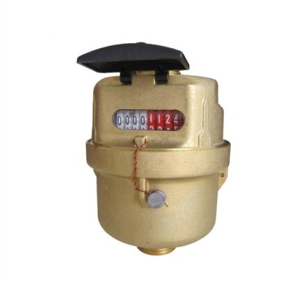 A photo of a brass kent water meter. It has a hinged black lid and a face with a mechanical counter.