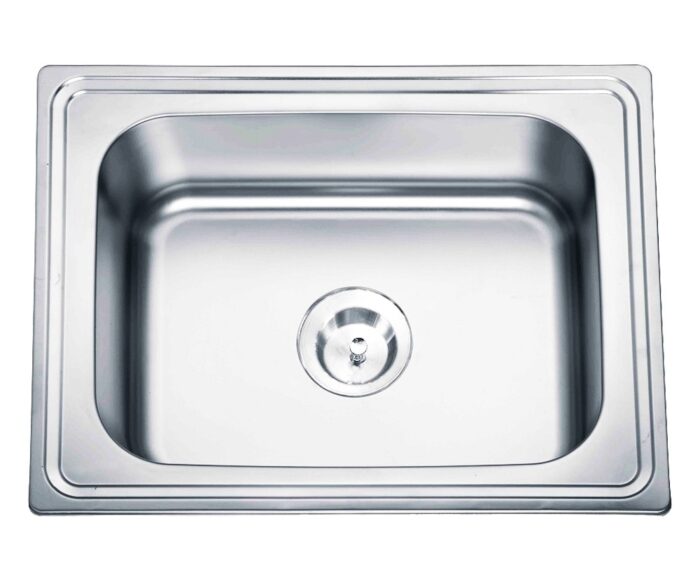 A gleaming, rectangular single-bowl stainless steel kitchen sink with a central drain.