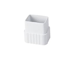 A short, white plastic PTG pipe socket. This fitting has a square opening at the top, a ridged body, and a square base. It is designed to connect a pipe to a square socket.