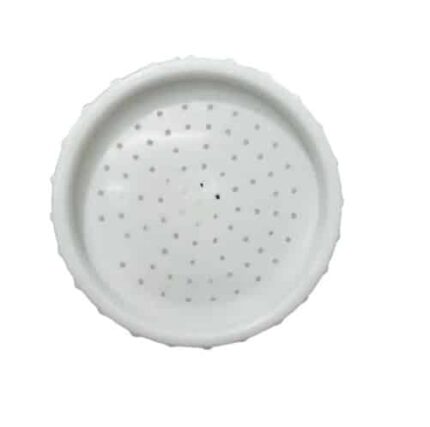 A close-up, top-down view of a white plastic shower rose. The circular head has a simple, minimalist design with a pattern of evenly spaced holes for water flow.