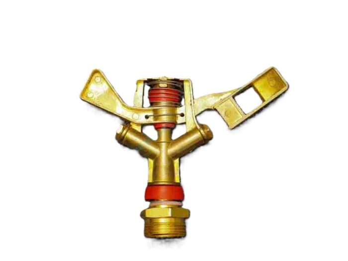 A brass and plastic sprinkler head. It features a brass body with two angled nozzles, a brass swivel mechanism with a red plastic collar, and a yellow frame.