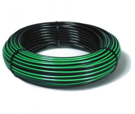 A large, coiled roll of black and green striped irrigation or drip-line hose. The coil is secured by several black zip ties.