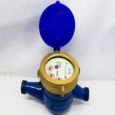 A product photo of a blue and brass water meter with a blue, hinged lid. The meter has a white face with a numerical display and red dials, and pipe fittings on both ends.