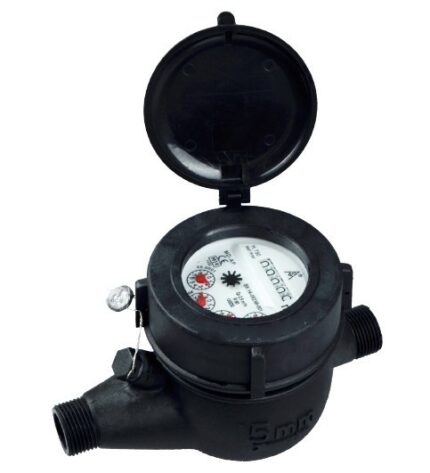 A photo of a black plastic water meter with a hinged lid. The meter has a white face with red and black numbers. A threaded pipe fitting is visible on each end.