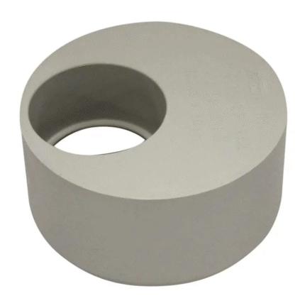 A small, light gray plastic waste reducing bush on a white background.
