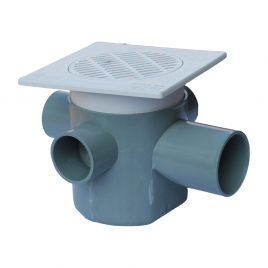 A gray plastic four-way floor trap on a white background. This drain has a square grate on top and four pipe inlets, one on each side, allowing it to collect wastewater from multiple directions.